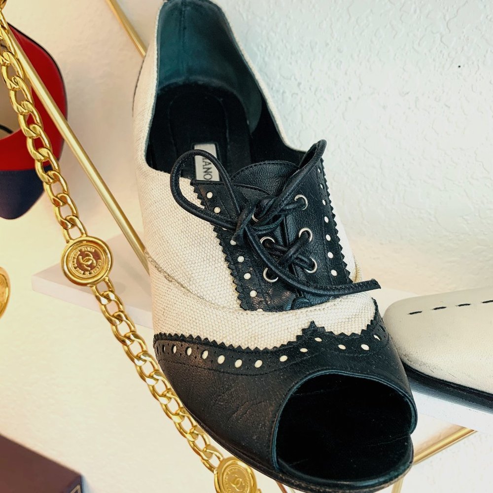 Manolo Blahnik Spectator Peep toe Pumps